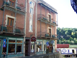 Flat Iron Building as seen from Spring Street; shops on Center Street - Eureka Springs, Arkansas Credit: Ken Rundel