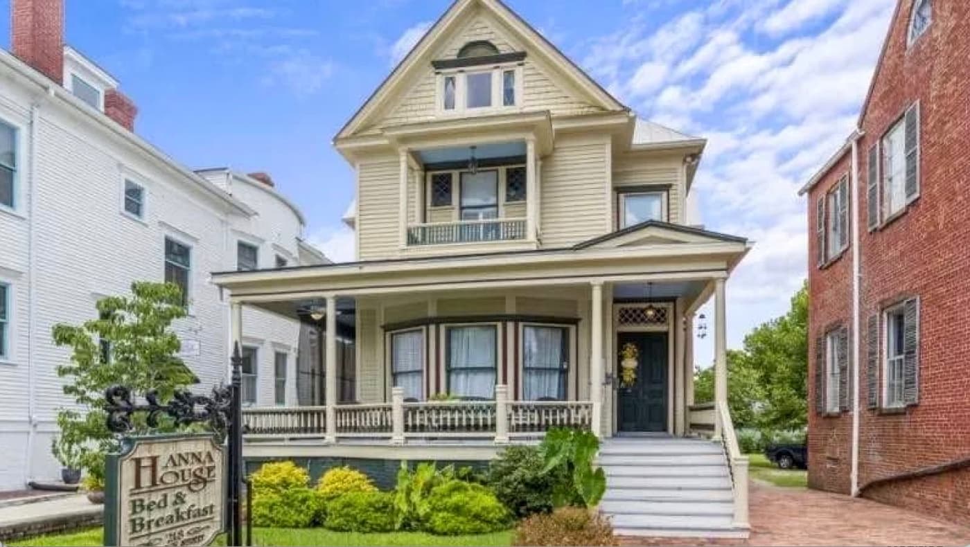 Exterior front view of the Hanna House Bed & Breakfast, a grand 1896 Colonial-Victorian home in the historic district of New Bern, NC.
