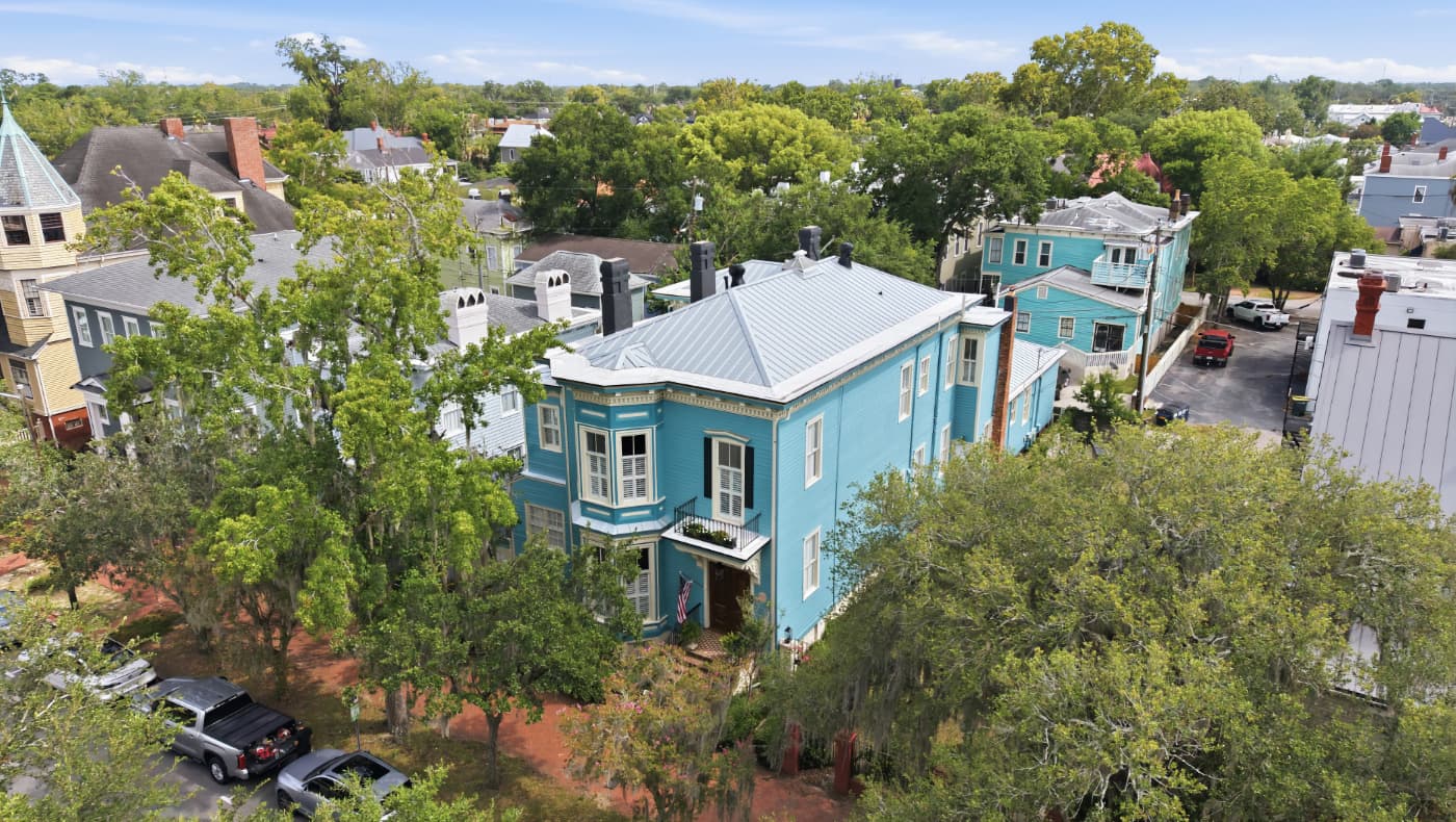 LIVE ONE BLOCK FROM FORSYTH PARK An extraordinary c.1872 restored Victorian estate in the heart of historic Savannah.