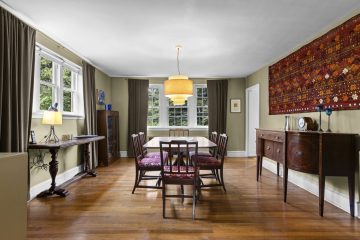 1938 Tudor Revival at 419 Lodges Lane, Elkins Park, Pennsylvania: dining room with windows overlooking the rear yard