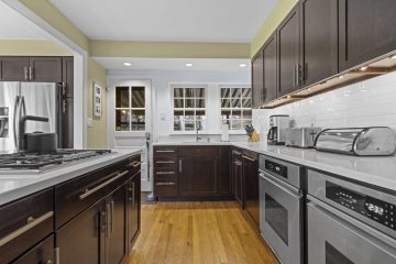 1938 Tudor Revival at 419 Lodges Lane, Elkins Park, Pennsylvania: kitchen with double ovens and full-height cabinets