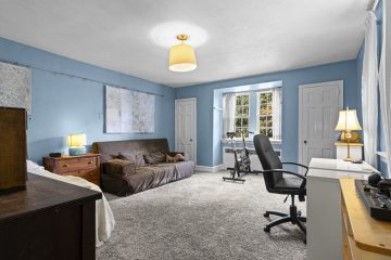 1938 Tudor Revival at 419 Lodges Lane, Elkins Park, Pennsylvania: second-floor bedroom with blue walls