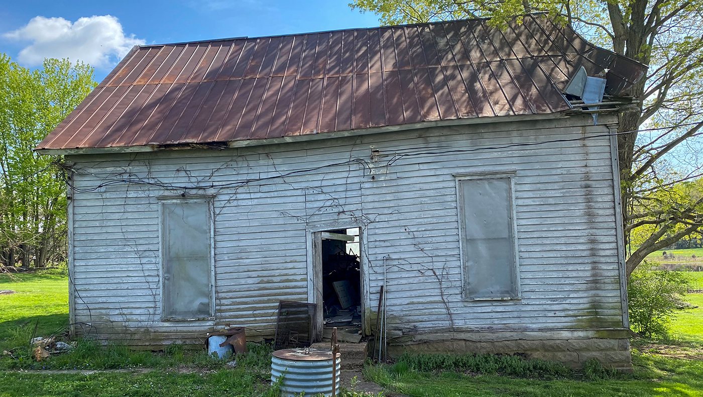 Flatwood School #9 in New Salisbury, Indiana: weathered one-room frame schoolhouse with a rusted metal roof